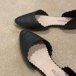 black restricted flats